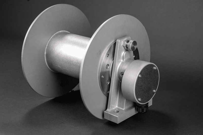 A 30amp reel with a metal cover displayed against a black background, featuring Cable Reels