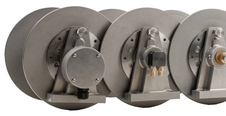 Three stainless steel reels with locks on each side, arranged neatly, showcasing their durable and secure design
